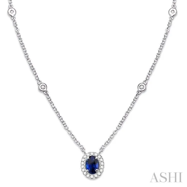 6X4MM Oval Cut Sapphire and 1/6 Ctw Round Cut Diamond Necklace in 14K White Gold