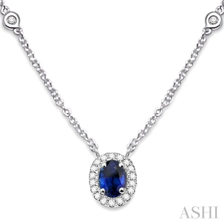 6X4MM Oval Cut Sapphire and 1/6 Ctw Round Cut Diamond Necklace in 14K White Gold