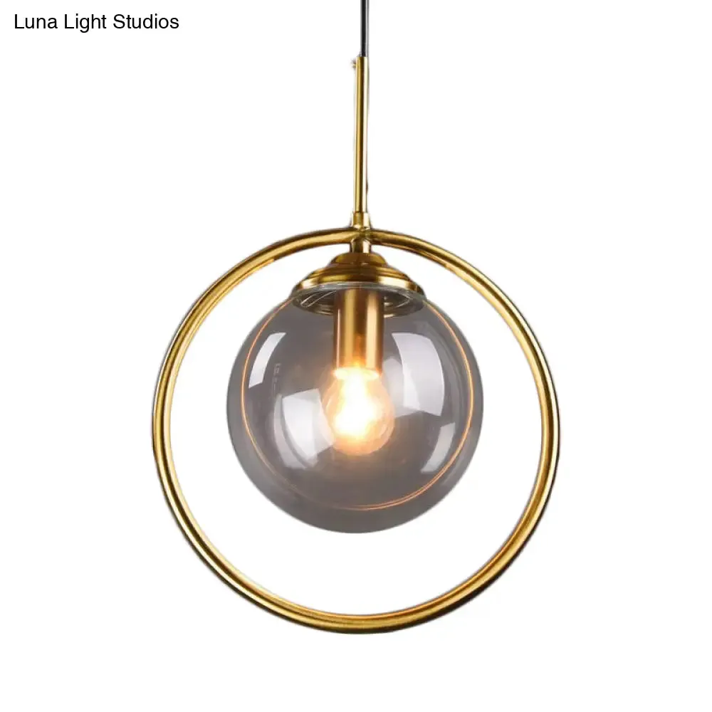 Postmodern Gold Globe Pendant Lamp with Smoke Gray/Clear Glass for Bedroom Lighting