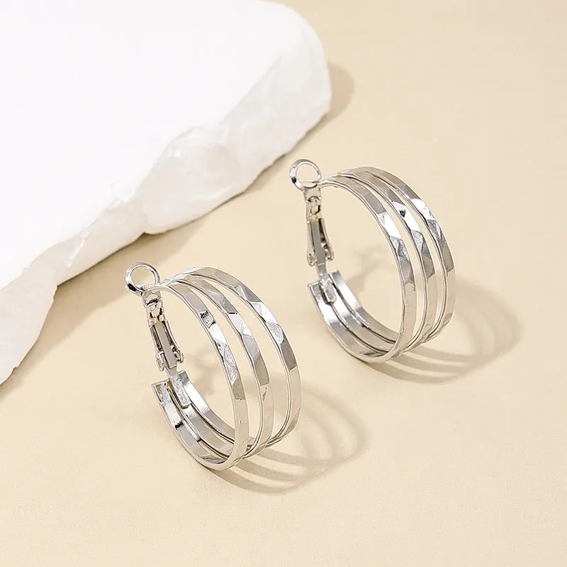 Retro Chic Metal Earrings with Unique Circle Design - Vienna Verve Collection