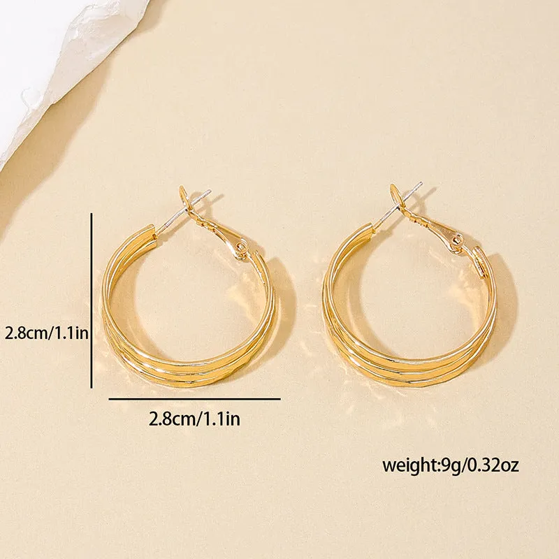 Retro Chic Metal Earrings with Unique Circle Design - Vienna Verve Collection