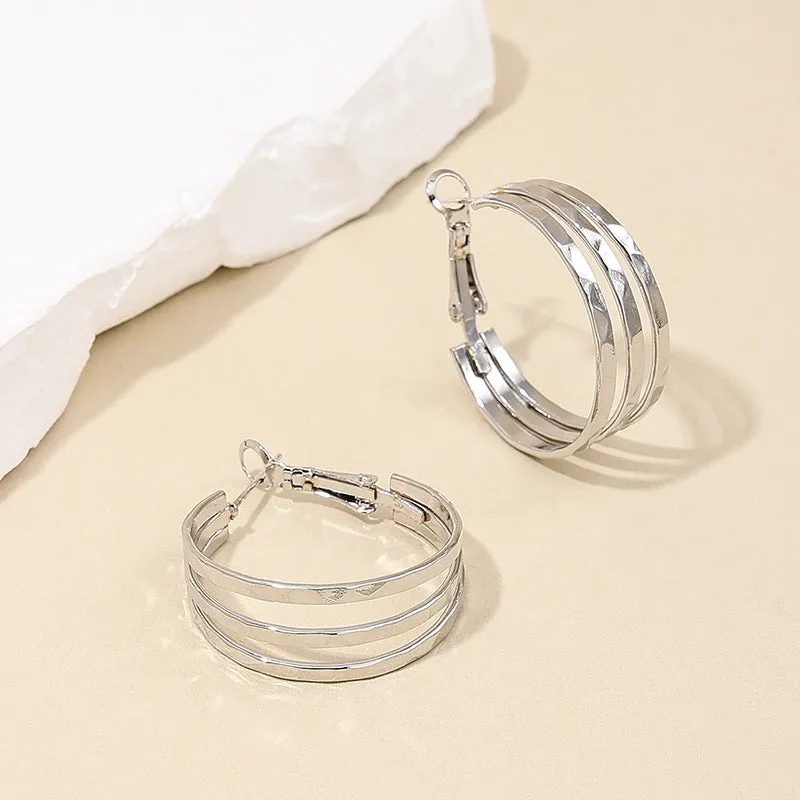 Retro Chic Metal Earrings with Unique Circle Design - Vienna Verve Collection