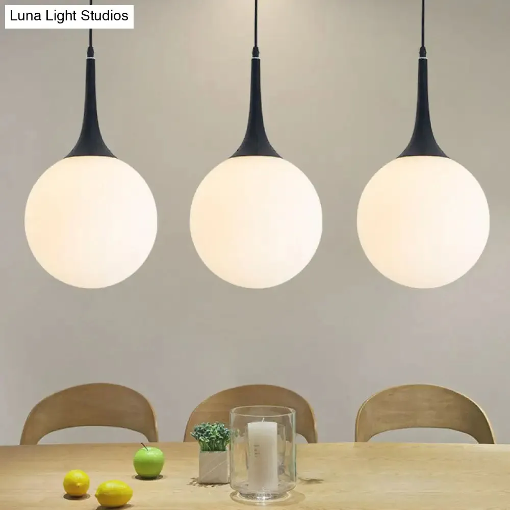 Sleek 1-Light Suspension Pendant: Minimalist Glass Hanging Light for Dining Room