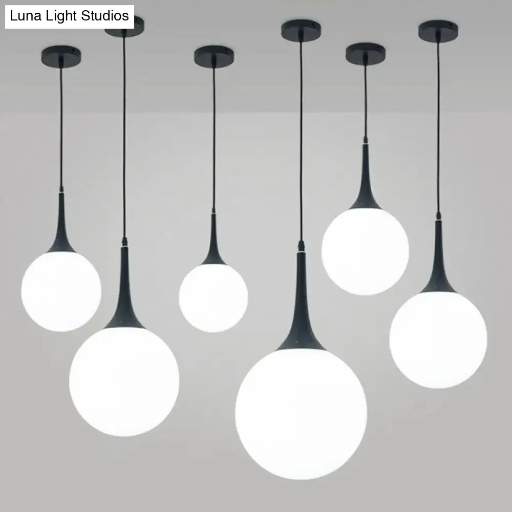 Sleek 1-Light Suspension Pendant: Minimalist Glass Hanging Light for Dining Room