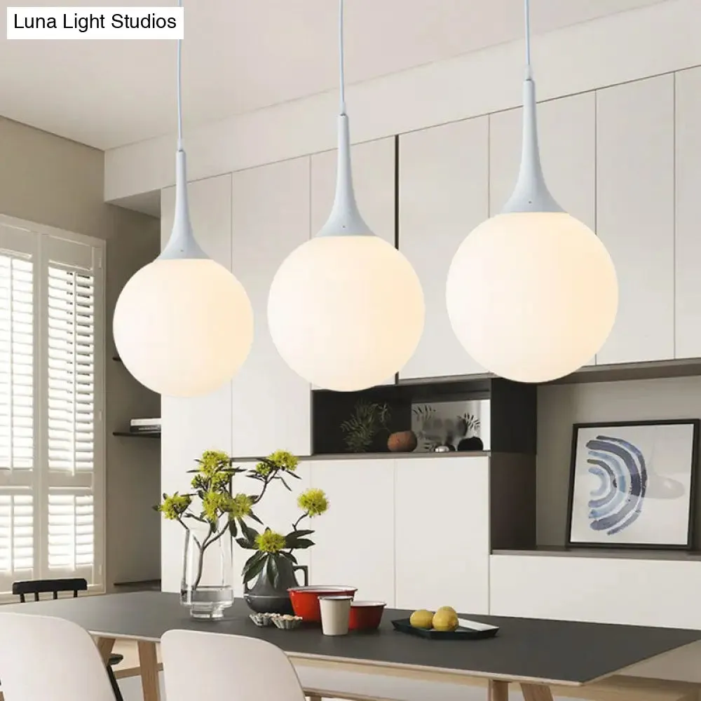 Sleek 1-Light Suspension Pendant: Minimalist Glass Hanging Light for Dining Room