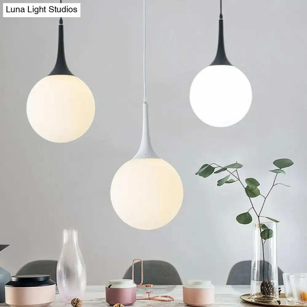 Sleek 1-Light Suspension Pendant: Minimalist Glass Hanging Light for Dining Room